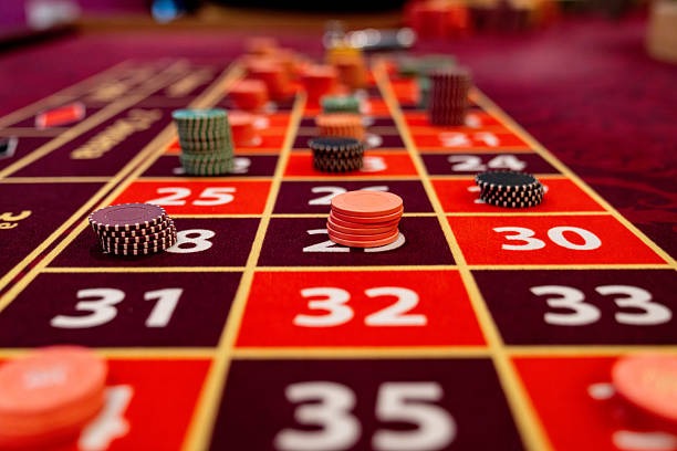 rabat4d Dice Game interface showing payout table and roll button